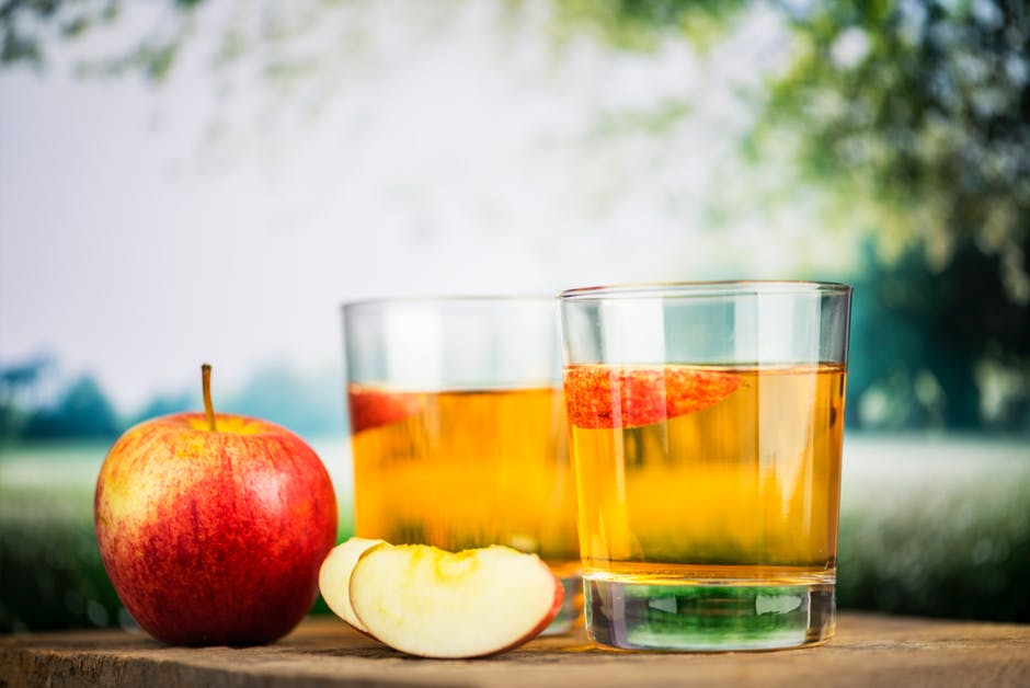 Glasses of Apple cider vinegar