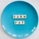 Blue dinner plate with burn fat written on it